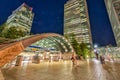 LONDON - JUNE 14, 2015: Lights of Canary Wharf buildings at night. Canary Wharf is the city financial district Royalty Free Stock Photo