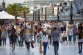 LONDON, Lots of people walking by river Thames. City of London in weekend