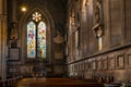 Stained glass window illustrated Bible stories in the St Mary Abbots Church, Kensington