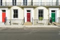 London - March 30: A row of typical town houses in London Kensington with colorful doors on March 30, 2017 Royalty Free Stock Photo