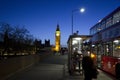 London night with Big Ben and double decker bus Royalty Free Stock Photo