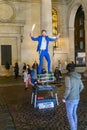 Street performer at night in Covent Garden, London Royalty Free Stock Photo