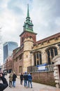 London old church of all hallows by the tower and people walking