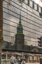 London old church of all hallows by the tower reflected in other building