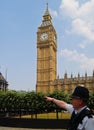 London policeman points the way. Royalty Free Stock Photo