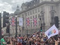Thousands of gay activists with LGBT flags at the Pride parade in London , England 2023