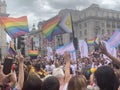 Gay activists with LGBT flags at the Pride parade in London , England 2023
