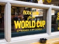 A London pub. Window advertising to book now to watch the World Cup. Royalty Free Stock Photo