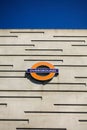 A London public transport logo sign for the overground rail network. Royalty Free Stock Photo