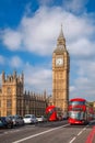 London with red buses against Big Ben in England, UK Royalty Free Stock Photo