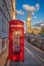 London with red phone booth against Big Ben in England, UK Royalty Free Stock Photo