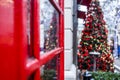 London red phone box and Christmas tree Royalty Free Stock Photo