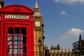 London Red telephone box foreground with Big Ben clock in background and blue sky Royalty Free Stock Photo