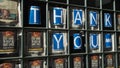 A London restaurant displays Thank You NHS posters in the front window. Pan left to right.