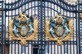 Royal Crest at Buckingham Palace Gate - famous landmark in London. Built in 1705, Palace is official