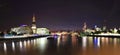 London's financial district over Thames by night Royalty Free Stock Photo