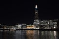 London`s Shard photographed by night near the water