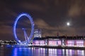 LONDON - SEPTEMBER 16: London Eye over Thames River at night