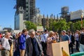 Climate Change protesters demonstrating in Parliament Square, London with The Houses of Parliament in the background