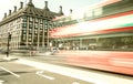 LONDON - SEPTEMBER 26, 2016: Red bus crosses Westminster Bridge, long exposure. London attracts 30 million people annually Royalty Free Stock Photo