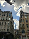 The London Shard towering up between two London buildings