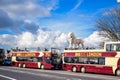 Local London sightseeing bus taking tourists places in the city of London Royalty Free Stock Photo