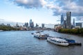 London Skyline Looking East Down River Thames With Pleasure Party Boats Moored