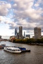 London Skyline Looking East Down River Thames With Pleasure Party Boats Moored