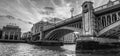 London Southwark bridge in Thames river UK, black and white.