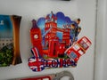 London souvenir magnet on a white metal board - big Ben, Tower bridge and double decker bus