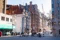 London street scene with crowds of people and bussy traffic