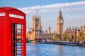 London symbols with BIG BEN, DOUBLE DECKER BUSES and Red Phone Booth in England, UK