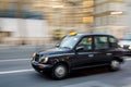 London Taxi Cab on the move Royalty Free Stock Photo