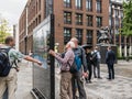 London tourists study street map near St. Paul's cathedral