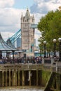 LONDON, Tower bridge and lots of walking people on south bank