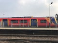 London Train going past Wandsworth Town Train Station at speed