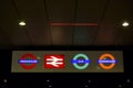 London Transport four illuminated signs