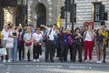 london, U.K., August 22, 2019 - asian group of tourists, visitors crossing the street in loondon