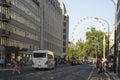 London, U.K., August 22, 2019 - english treet with modern buildings and London Eye, a giant and famous ferris wheel in London Royalty Free Stock Photo