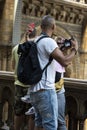 London, U.K., August 22, 2019 - a male takes pictures in Natural History Museum of London, central hall