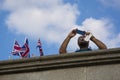 london, u.K., August 22, 2019 - Man taking photo on his smartphone. Mobile photography became very popular in the last few years