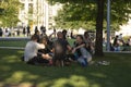 London, U.K. August 23, 2019 - People enjoying the summer, sitting on grass at Regent's Park in London