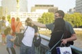 London, U.K., August 22, 2019 - tourist couple taking photo near Palace of Westminster, Westminster Bridge, London, England