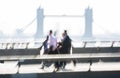 London, UK. Blurred image of Office workers crossing the London bridge in early morning on the way to the City of