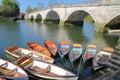 LONDON, UK - APRIL 9, 2017: Colorful boats on the river Thames in Richmond Southwest London with Richmond Bridge in the backgrou