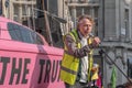 London, UK - April 15, 2019: Extinction Rebellion campaigners spokesman gave speech on a a pink boat in blocked Oxford Circus