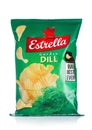 LONDON, UK - APRIL 15, 2019: Pack of Estrella crispy potato crisps chips with garden dill on white background