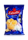 LONDON, UK - APRIL 15, 2019: Pack of Estrella crispy potato crisps chips with sour cream and onion on white background