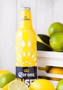 LONDON, UK - APRIL 27, 2018: Steel Bottle of Corona Extra Beer Sunset Editionon wooden background with fresh lemons and limes in w Royalty Free Stock Photo