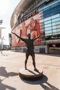 LONDON, UK - AUG 31, 2019 : Tony Adams bronze statue outside the North Bank End of the Emirates Stadium, North London, home of